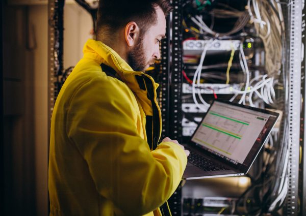 Young man engineer making program analyses